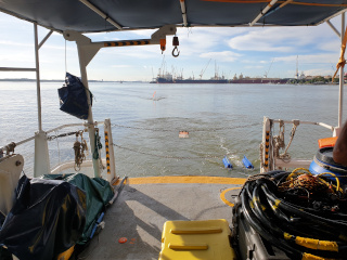 GSL hydrophone streamer and HMS Bubble Gun acoustic energy source deployed during data acquisition at the seas on the northern end of Singapore.